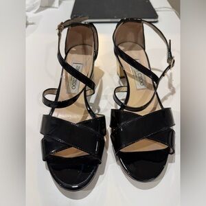 Jimmy Choo Black Pattern Leather Sandals with a gold heel